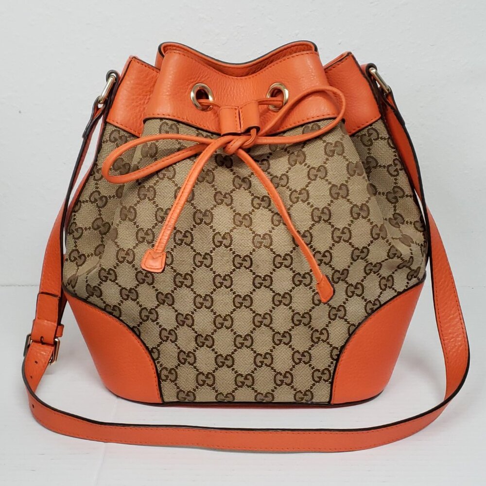 Authentic Gucci GG Supreme Bucket Bag Orange Leather Trim Crossbody Drawstring